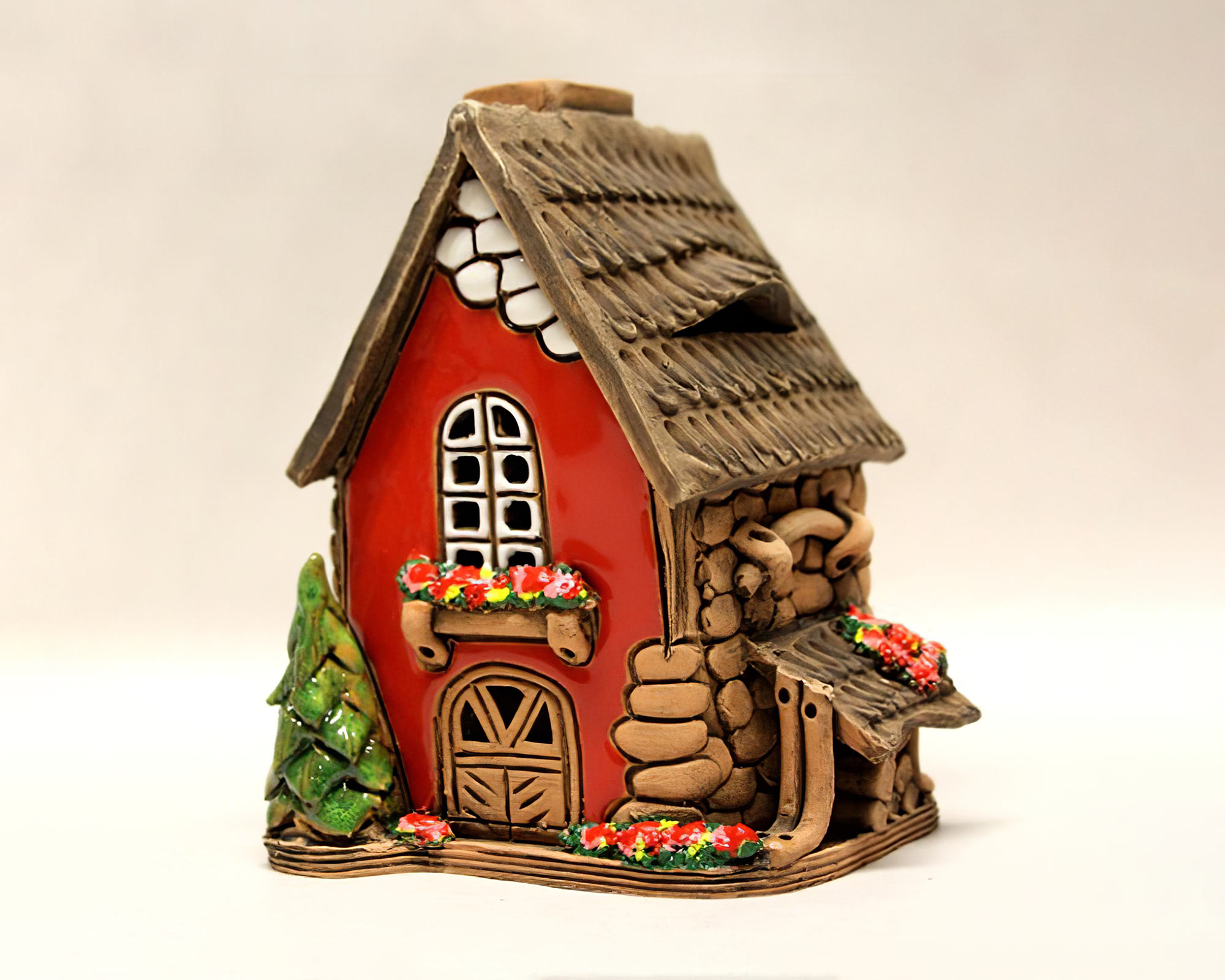 Portacandele a forma di casetta