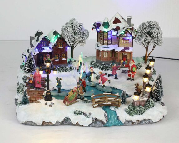 Villaggio nordico in movimento con lago, musica e led