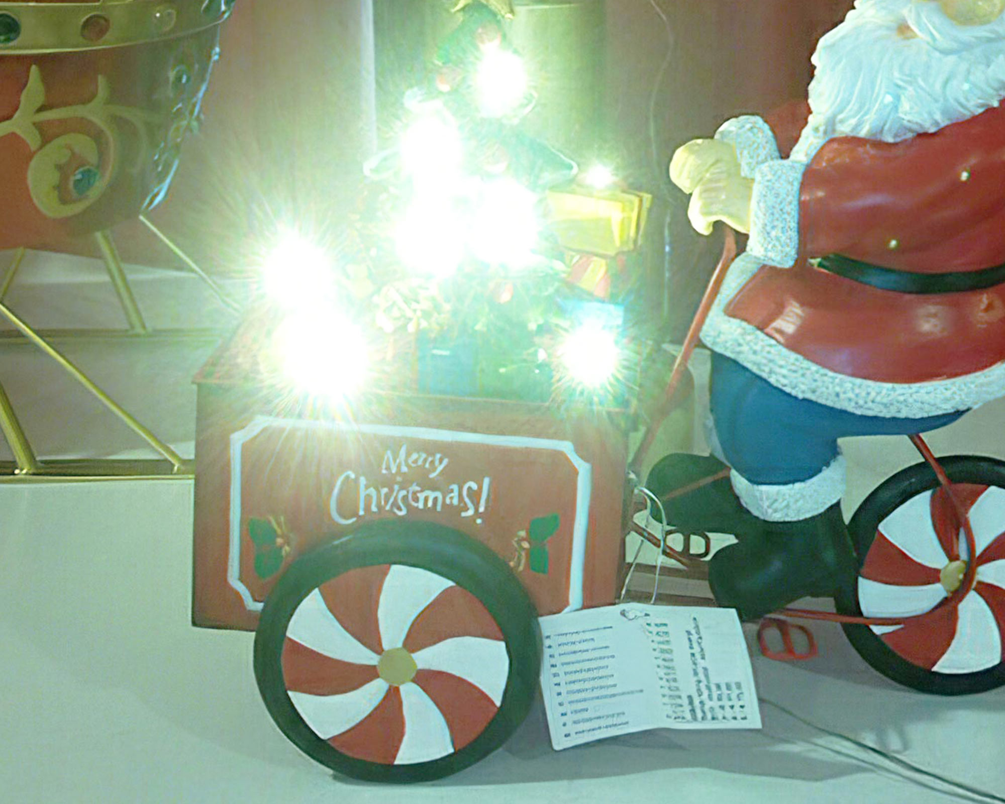 Decorazione natalizia a forma dei Babbo natale sul triciclo con led - immagine 2