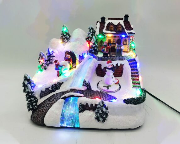 Villaggio natalizio in movimento con bambini, musica e led