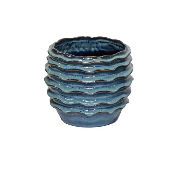 Vaso decorativo rotondo boheme wave ceramica smaltata colore blu avio su sfondo binaco.