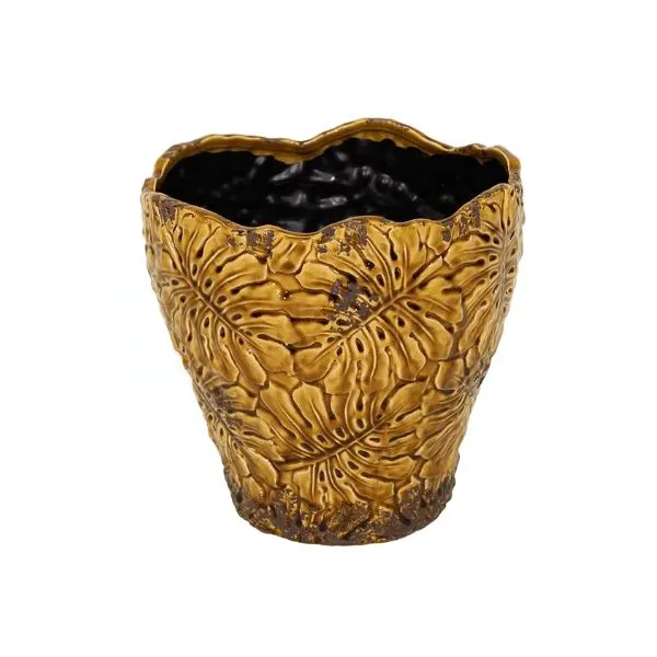 Il Vaso Decorativo Rotondo Bohemian Leaf Pot di Mega Collections (distribuito da Floral Garden) infonde un'atmosfera botanica e rétro irresistibile in qualsiasi ambiente interno colore ambra su sfondo bianco.
